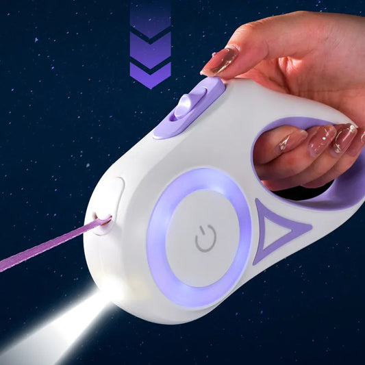Hand holding a white and purple device with a glowing purple light on a dark background