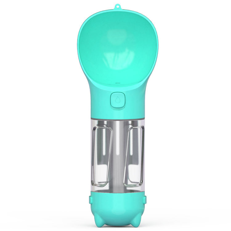Turquoise ice cream maker with clear container on a white background