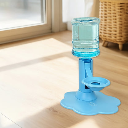A blue automatic water dispenser bottle stand with a flower-shaped base, shown on a wooden floor in a room setting. The image includes a product inset showing included accessories like a velcro, suction cup, straw brush, and transparent sticker.