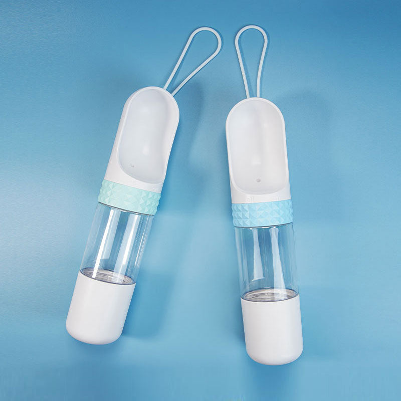 Two portable pet water bottles with white and light blue design on a blue background