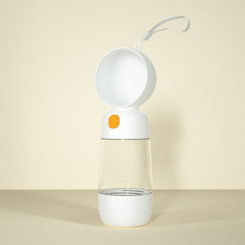 Clear water bottle with white cap and orange accent on a beige background